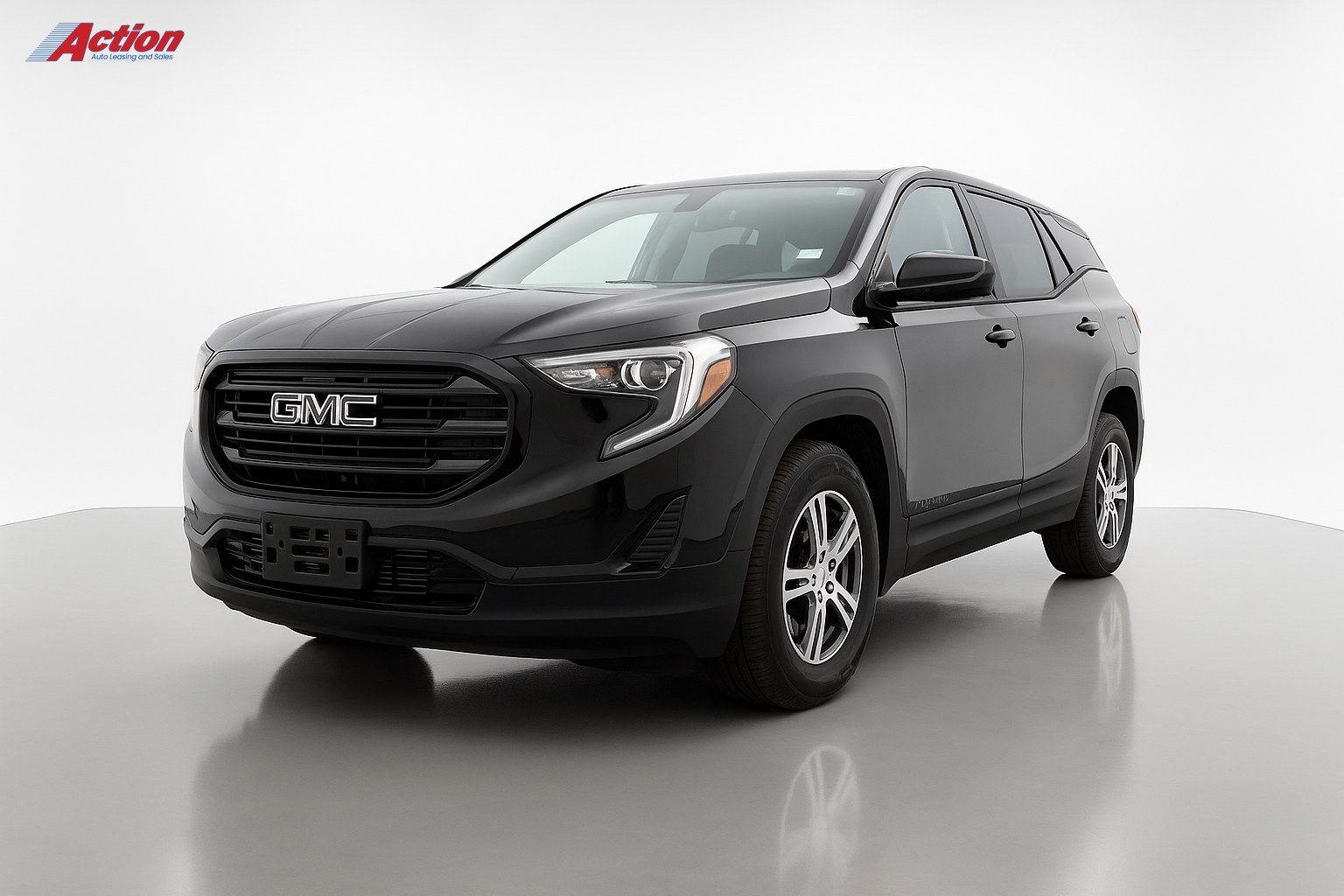 Black GMC SUV displayed in a well-lit studio setting with a clean background.